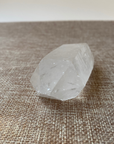 Clear Quartz Point For clarity, focus, and energy amplification.