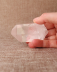 A raw Clear Quartz point chosen to support clarity, focus, and energy amplification.