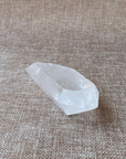 Clear Quartz Point For clarity, focus, and energy amplification.