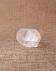 A raw Clear Quartz point chosen to support clarity, focus, and energy amplification.