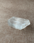 Clear Quartz Point For clarity, focus, and energy amplification.