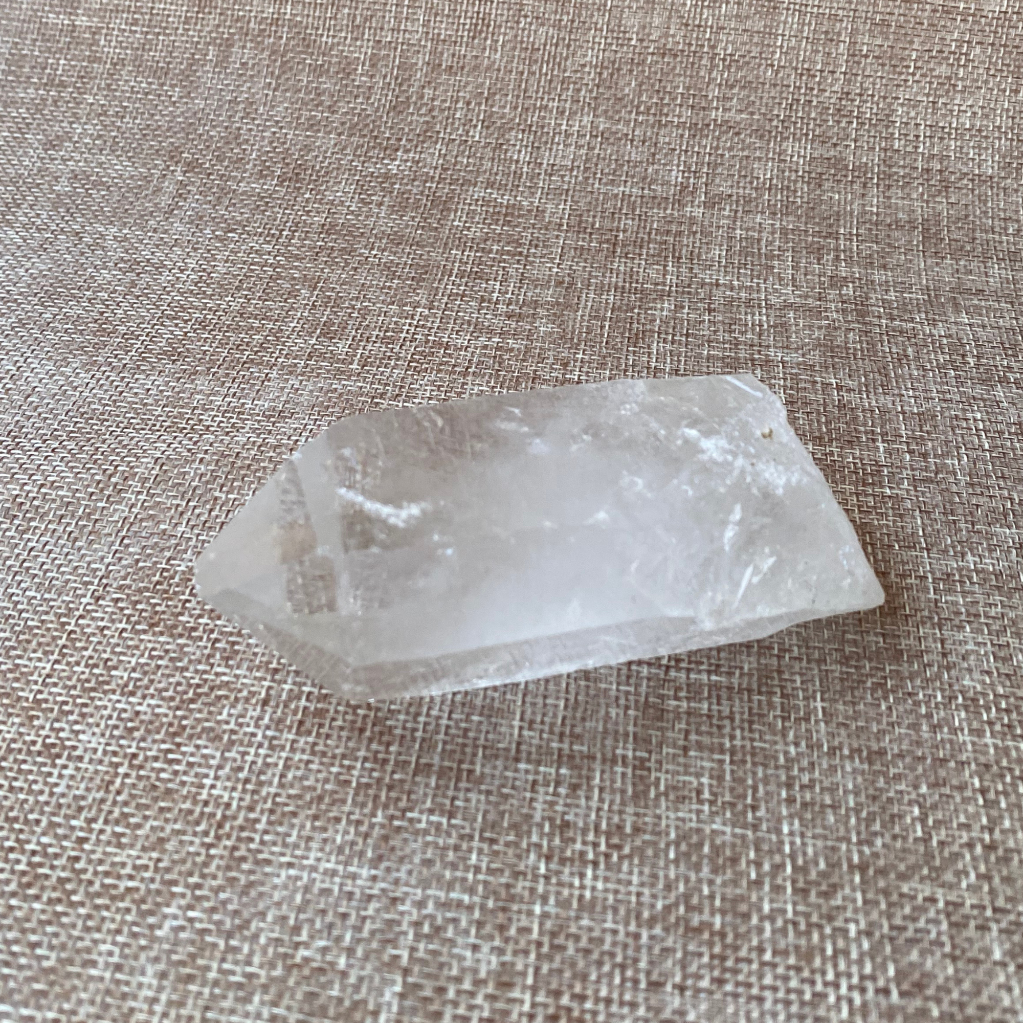 Clear Quartz Point For clarity, focus, and energy amplification.