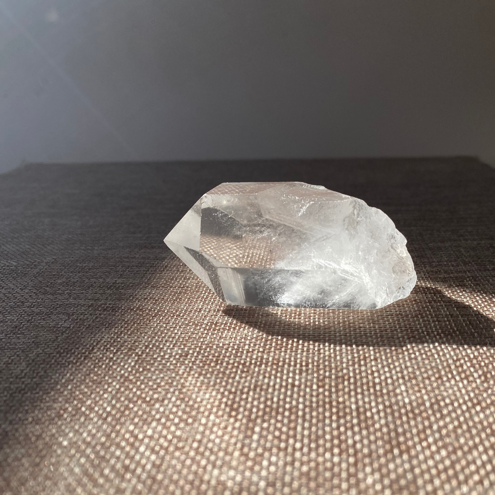 A raw Clear Quartz point chosen to support clarity, focus, and energy amplification.