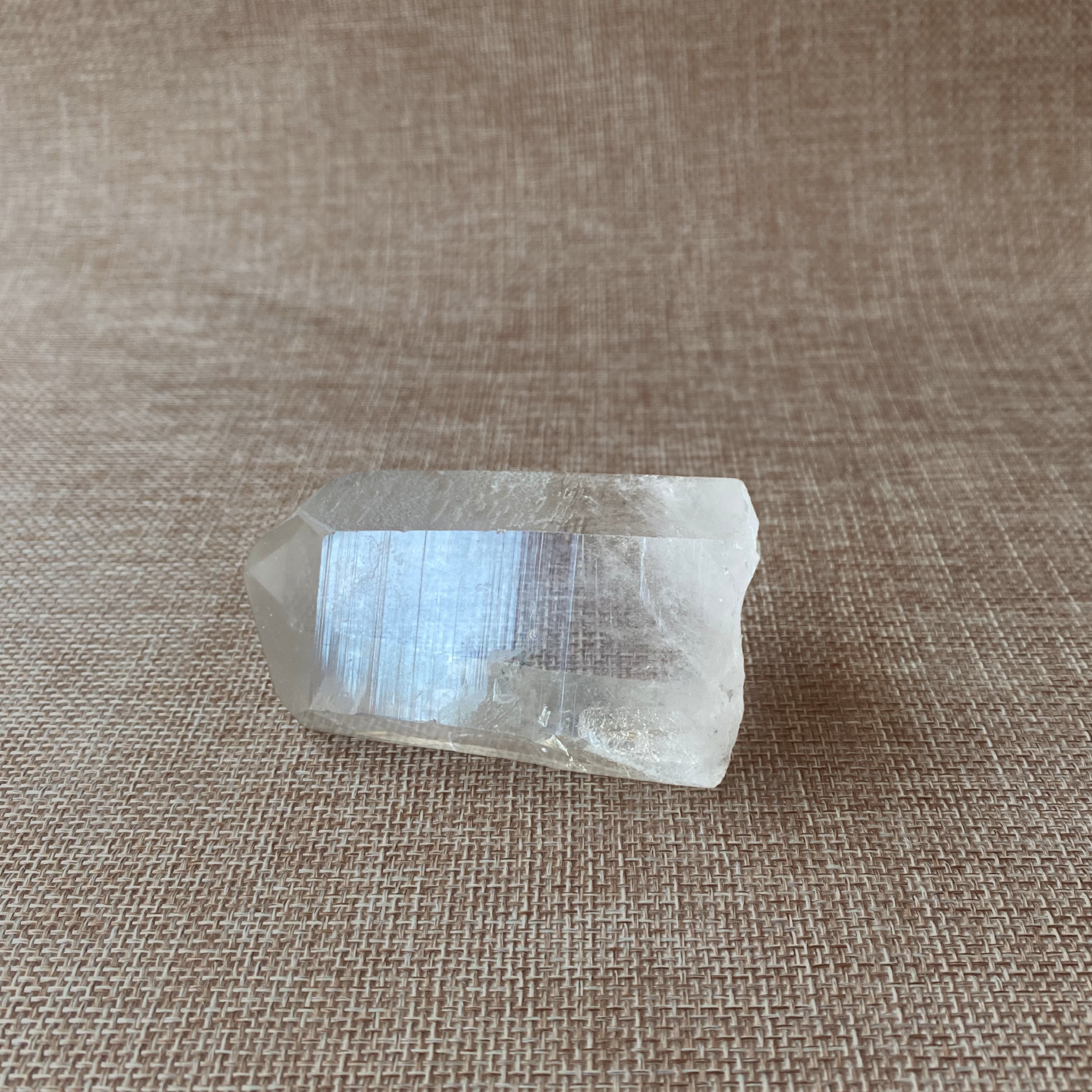 Clear Quartz Point with a Subtle Smoky Hue.