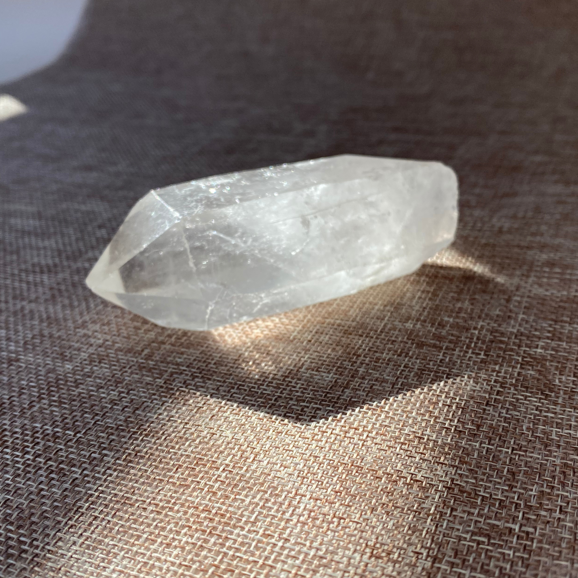 Clear Quartz Point For clarity, focus, and energy amplification.