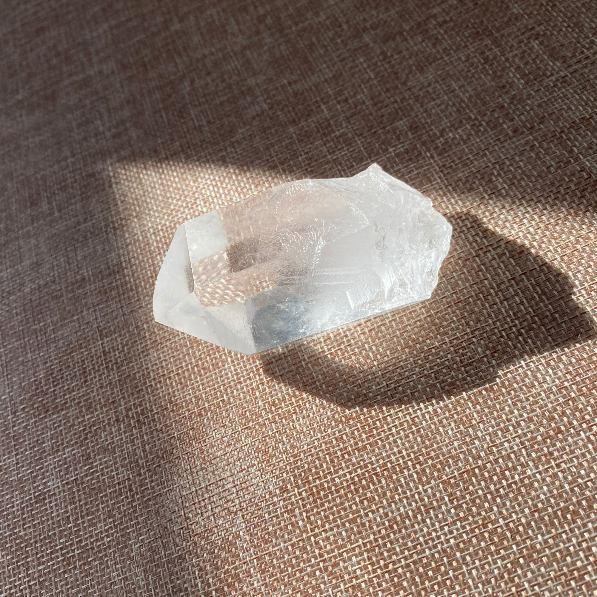 A raw Clear Quartz point chosen to support clarity, focus, and energy amplification.