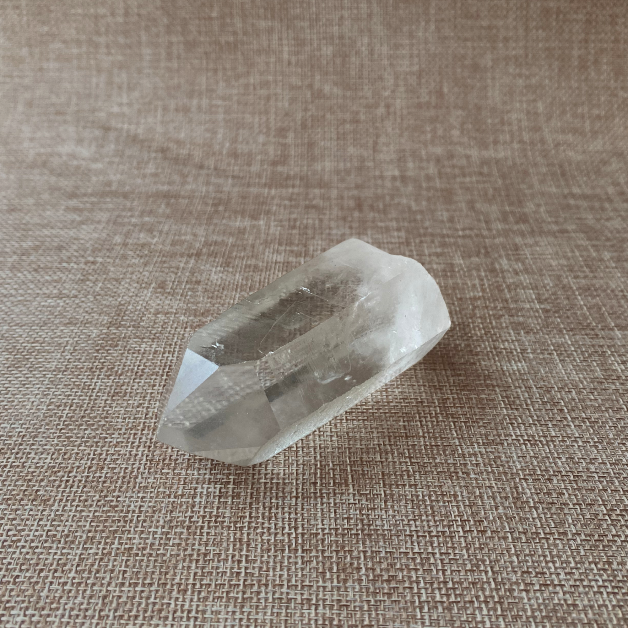 Clear Quartz Point with a Subtle Smoky Hue.