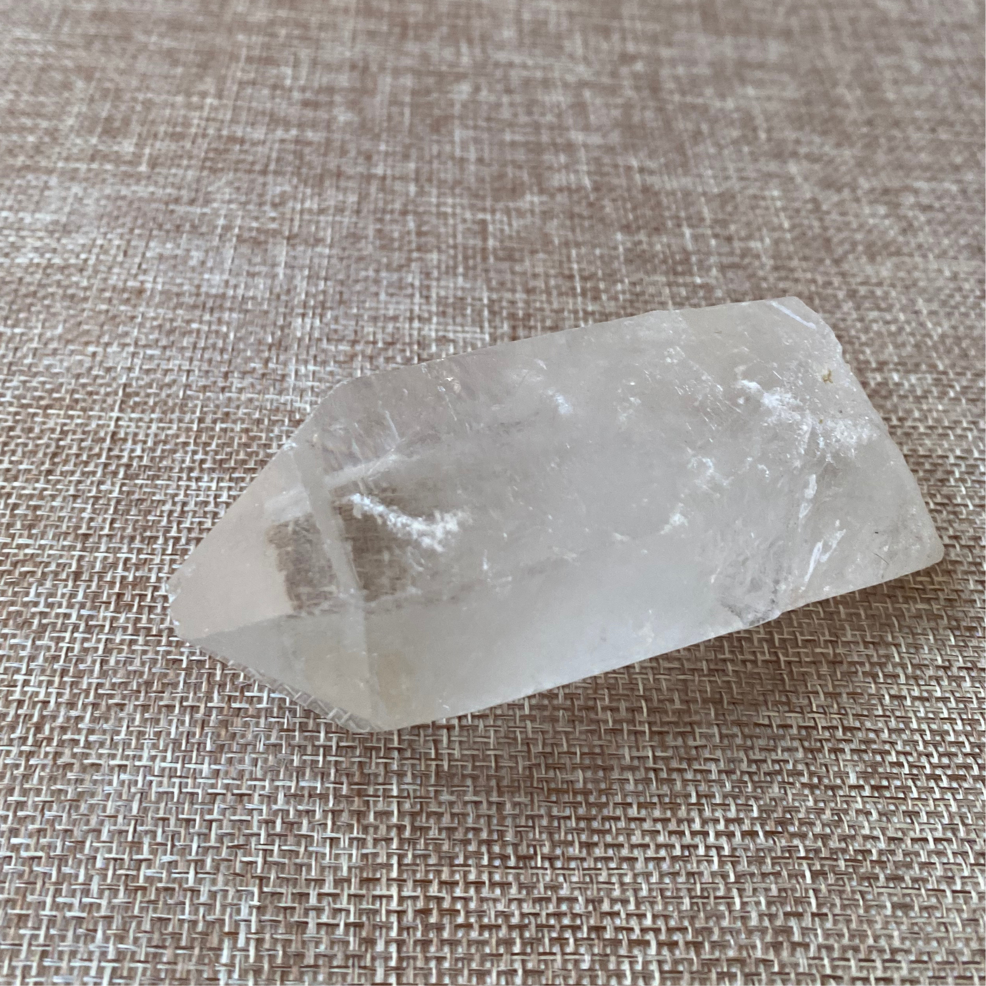 Clear Quartz Point For clarity, focus, and energy amplification.