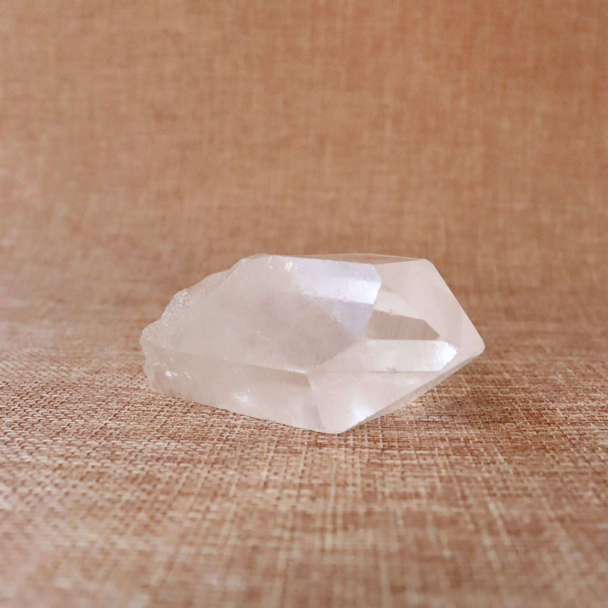 A raw Clear Quartz point chosen to support clarity, focus, and energy amplification.
