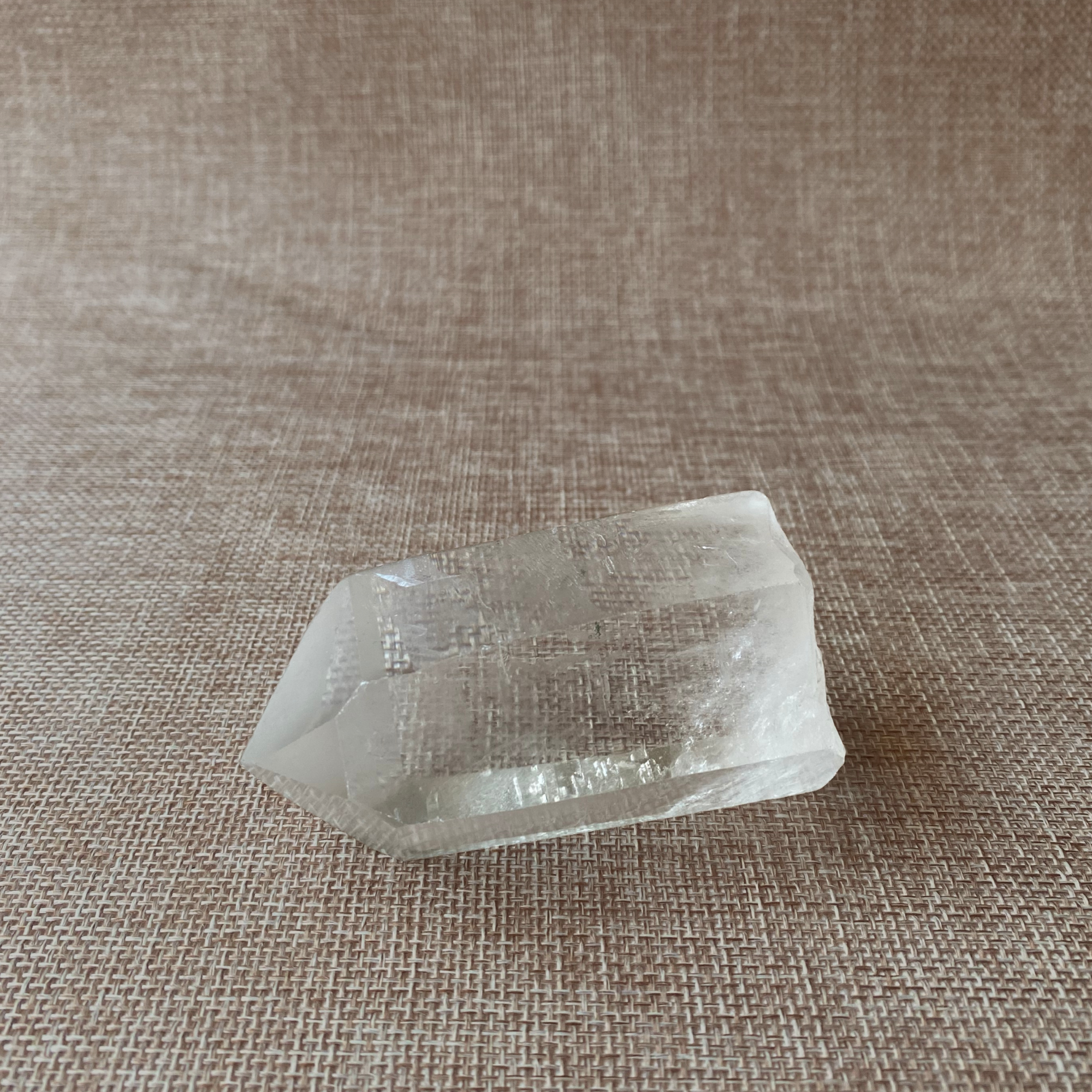 Clear Quartz Point with a Subtle Smoky Hue.