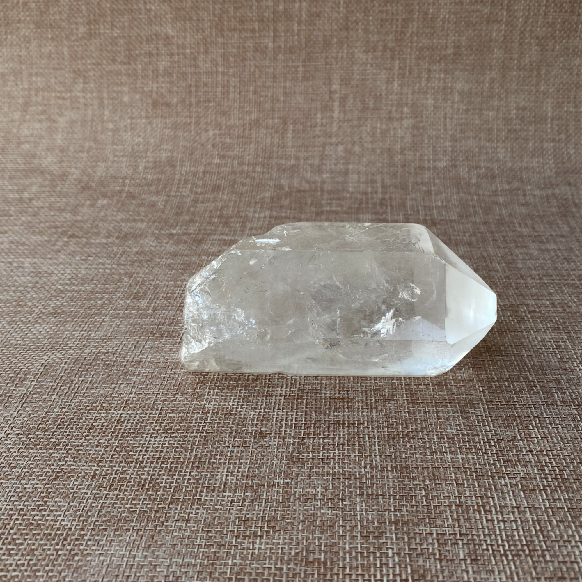Clear Quartz Point For clarity, focus, and energy amplification.