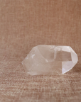 A raw Clear Quartz point chosen to support clarity, focus, and energy amplification.