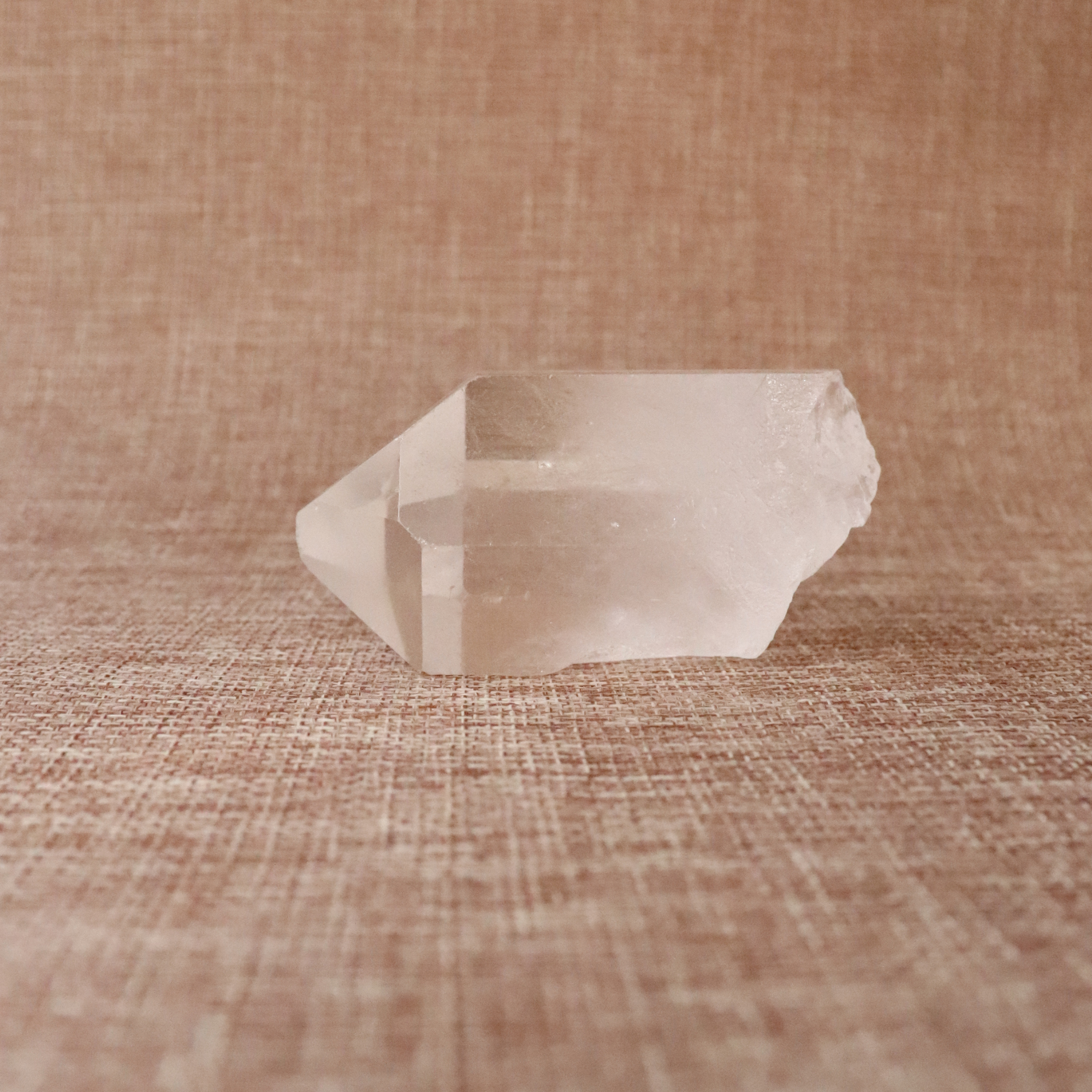 A raw Clear Quartz point chosen to support clarity, focus, and energy amplification.