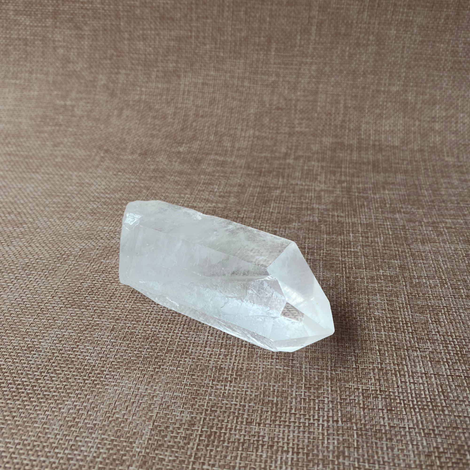 Clear Quartz Point For clarity, focus, and energy amplification.