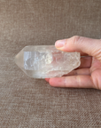 Clear Quartz Point For clarity, focus, and energy amplification.