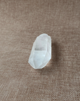 Clear Quartz Point For clarity, focus, and energy amplification.