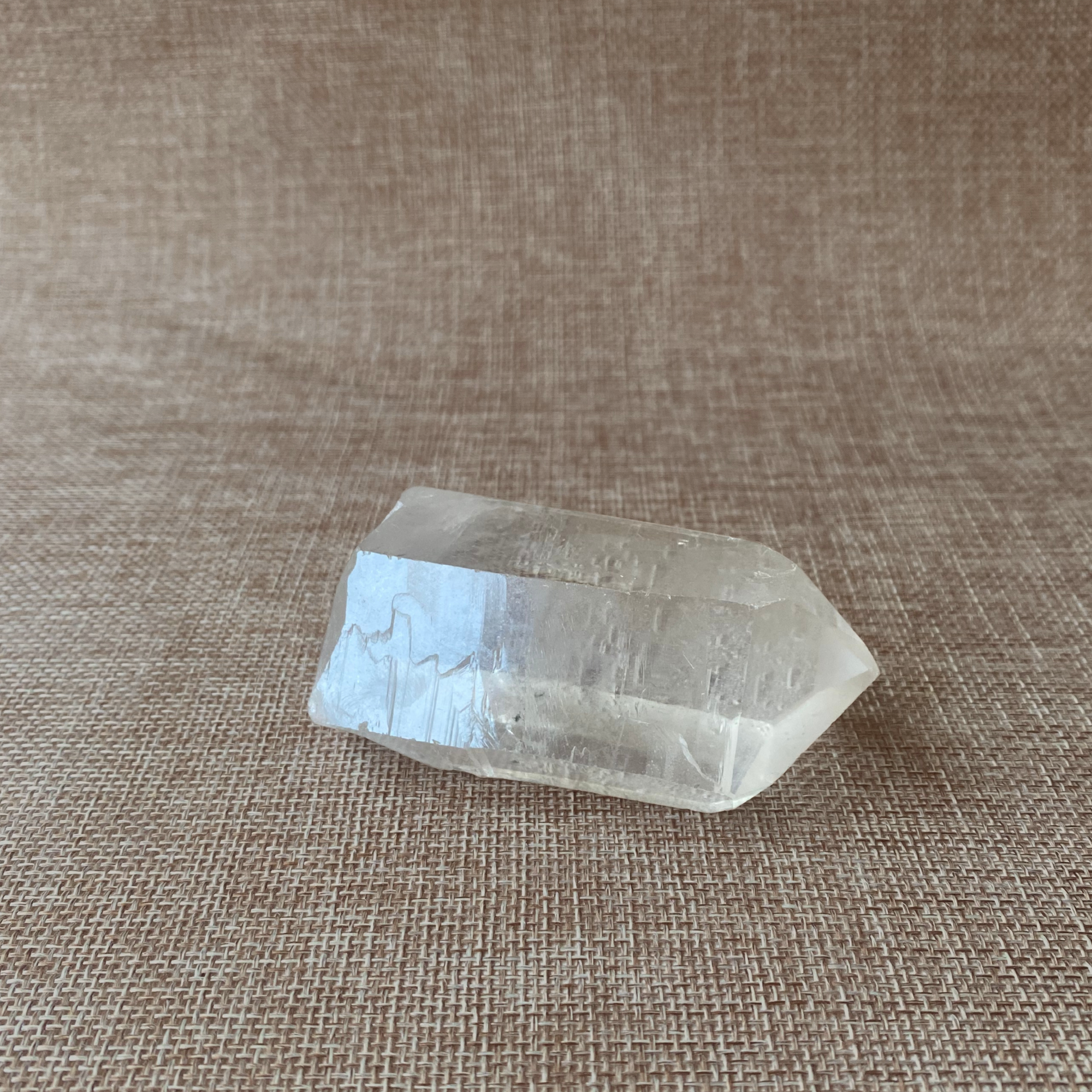 Clear Quartz Point with a Subtle Smoky Hue.