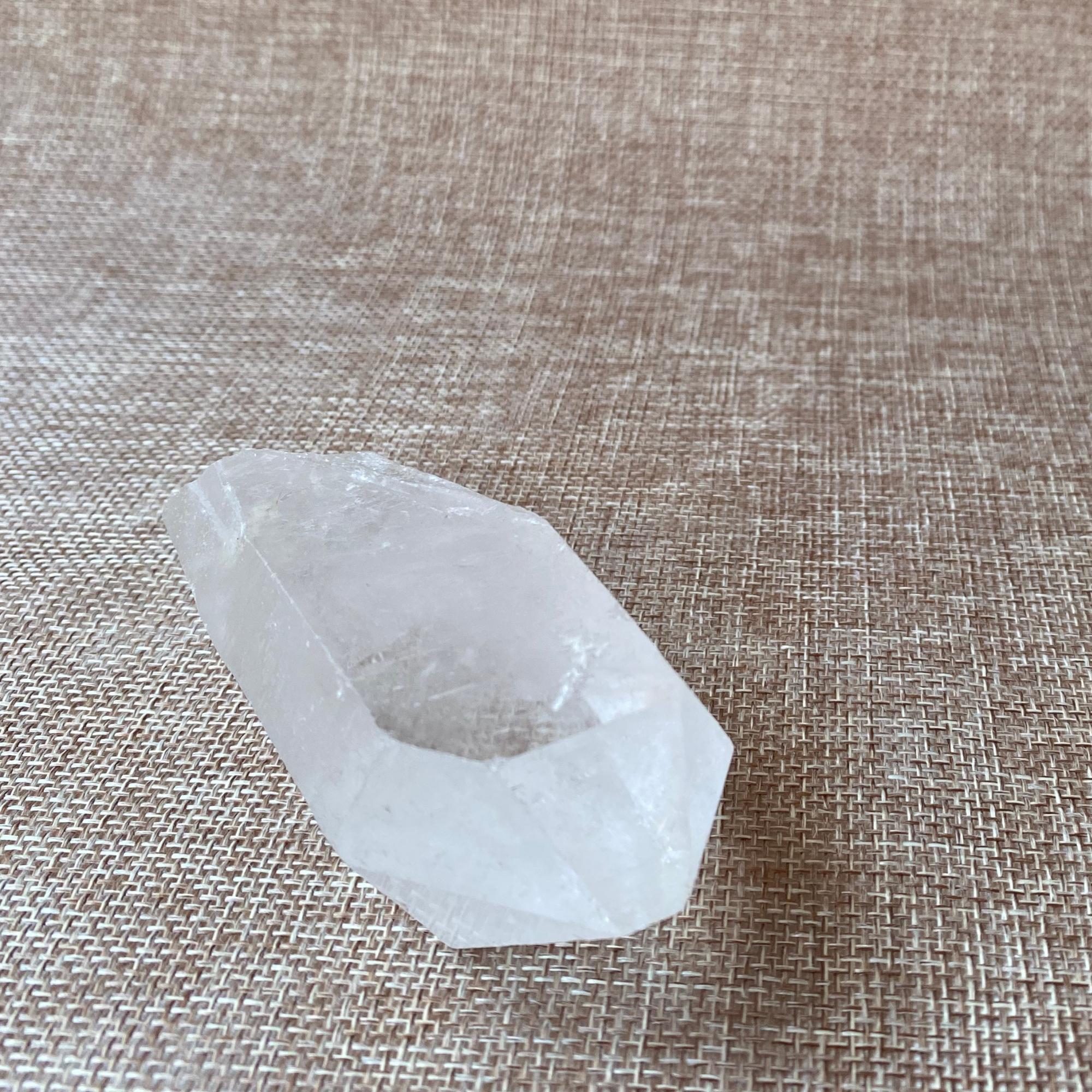 Clear Quartz Point For clarity, focus, and energy amplification.