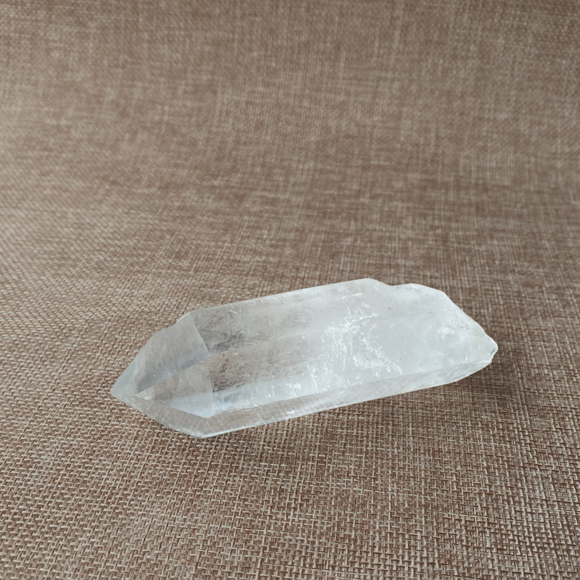 Clear Quartz Point For clarity, focus, and energy amplification.