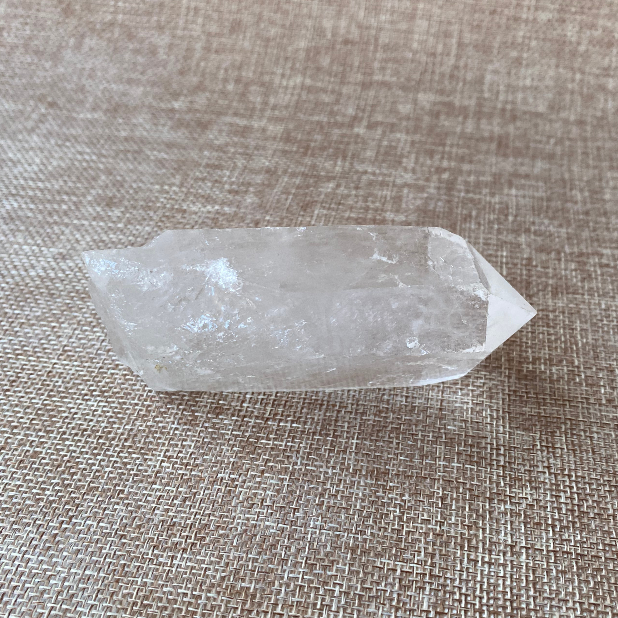 Clear Quartz Point For clarity, focus, and energy amplification.