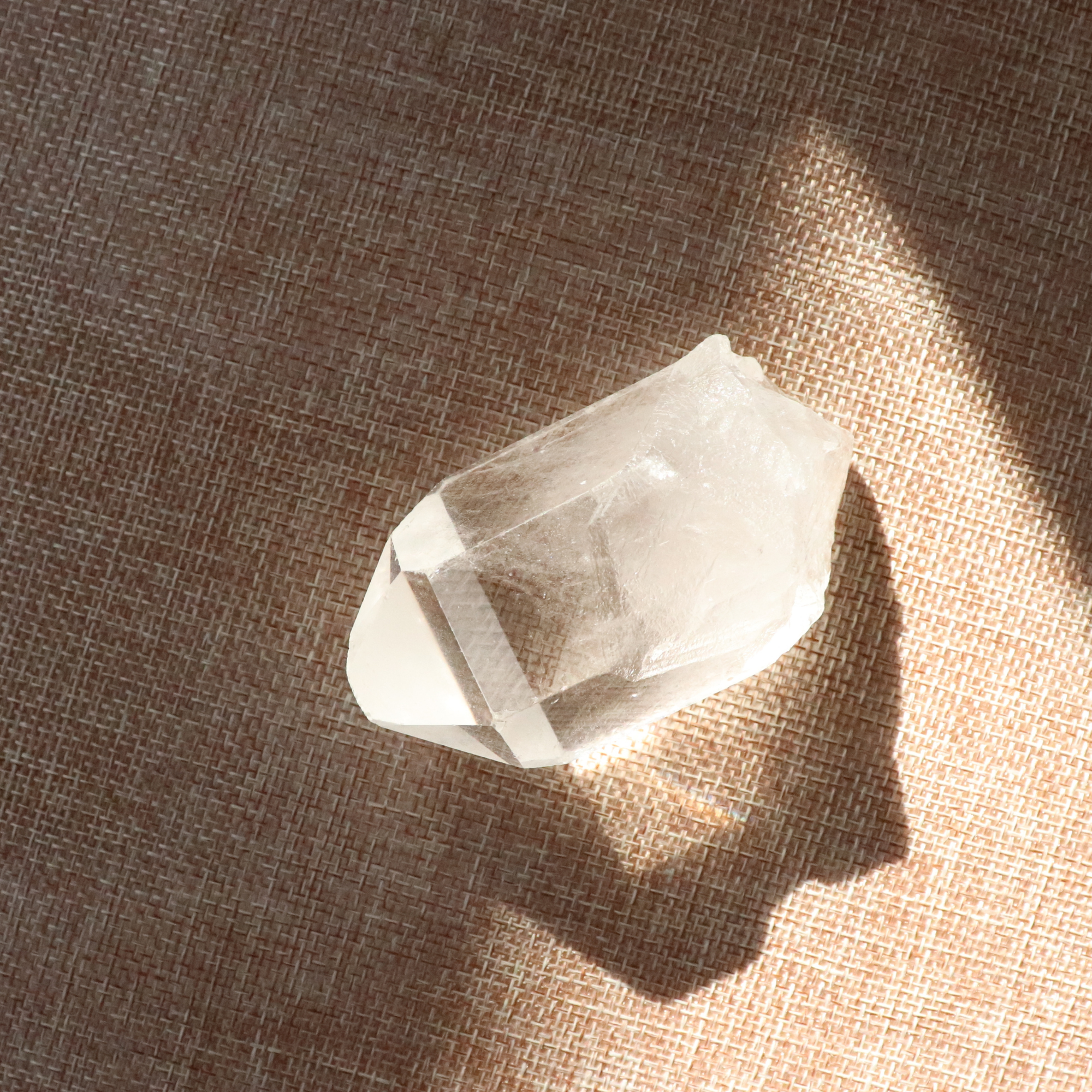 A raw Clear Quartz point chosen to support clarity, focus, and energy amplification.