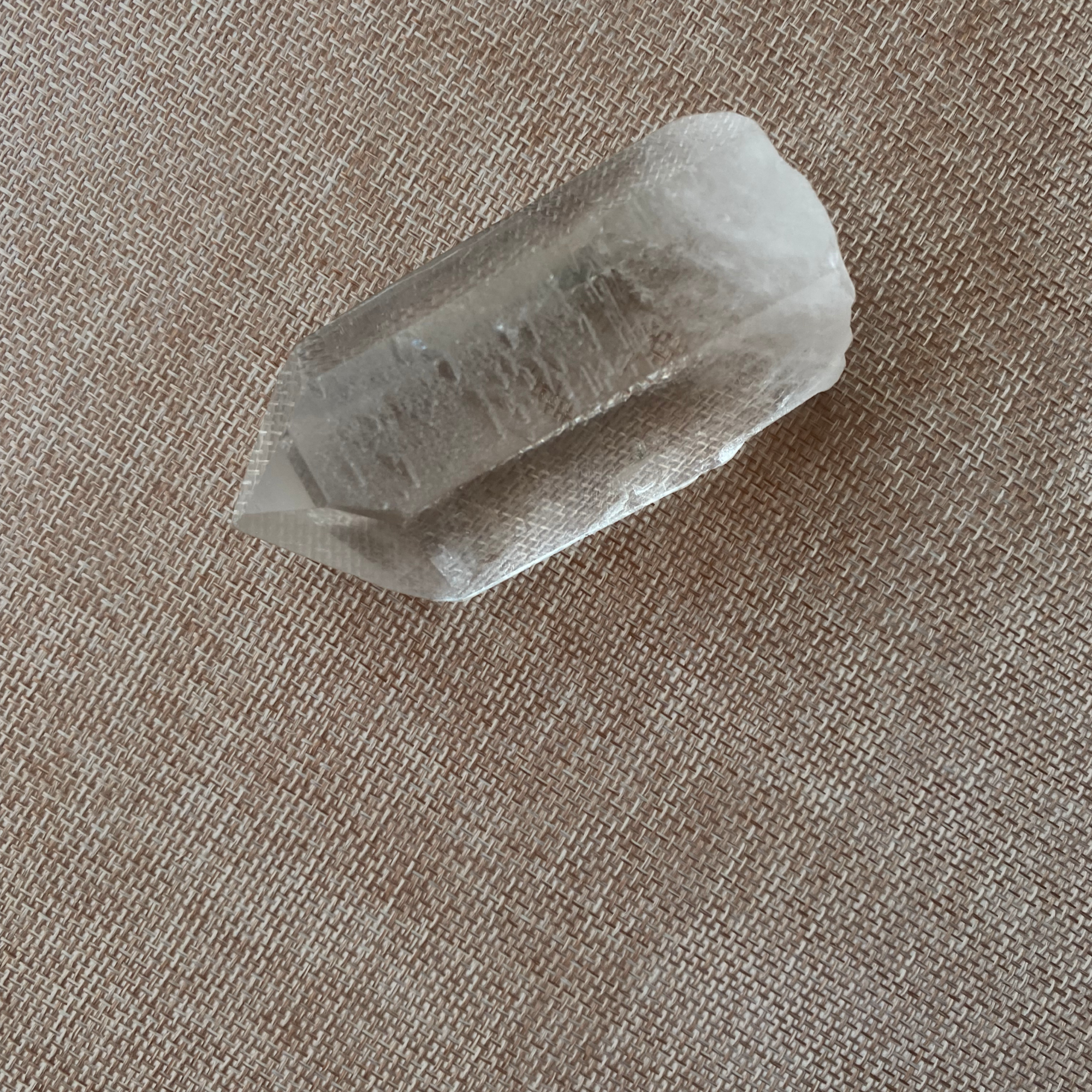 Clear Quartz Point with a Subtle Smoky Hue.