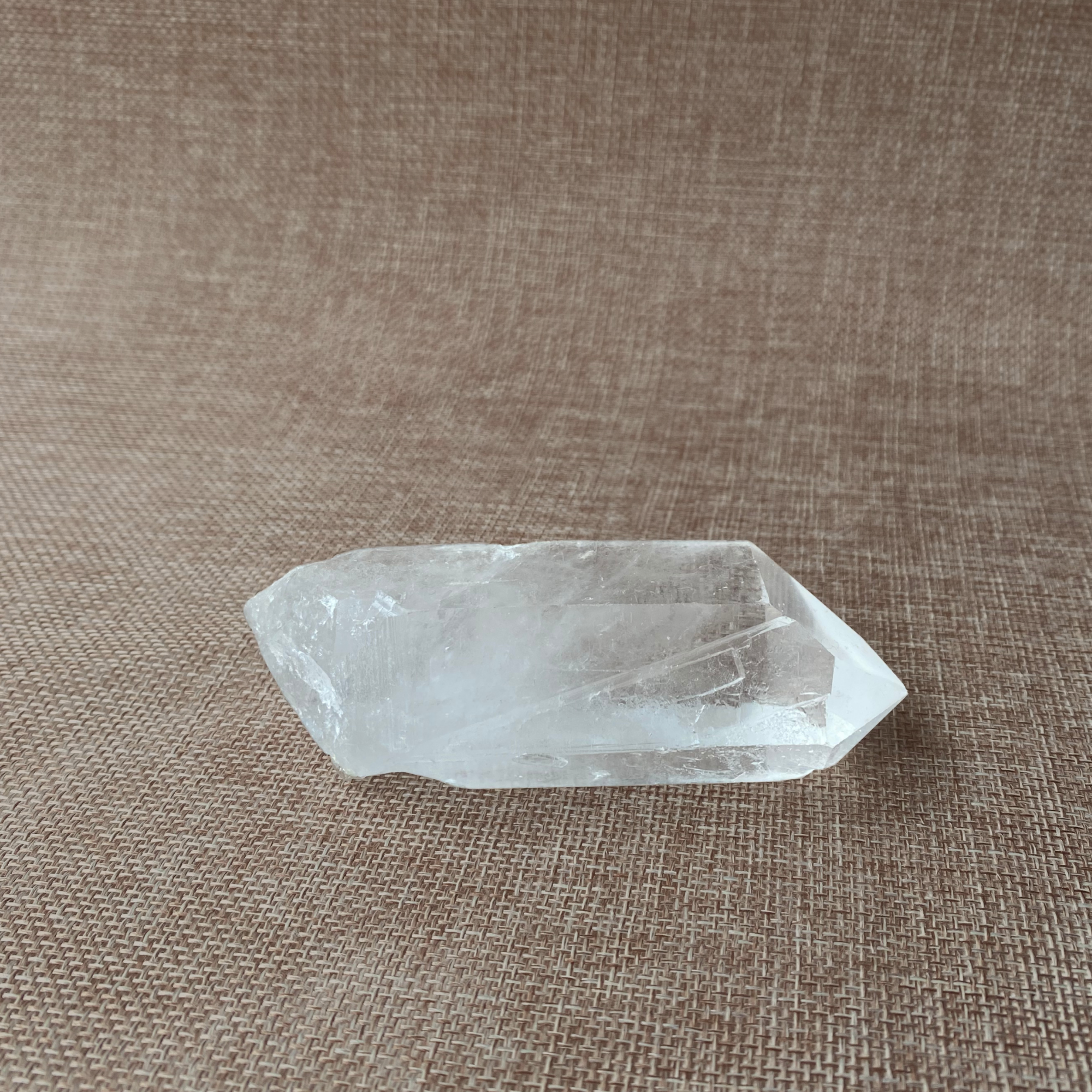 Clear Quartz Point For clarity, focus, and energy amplification.