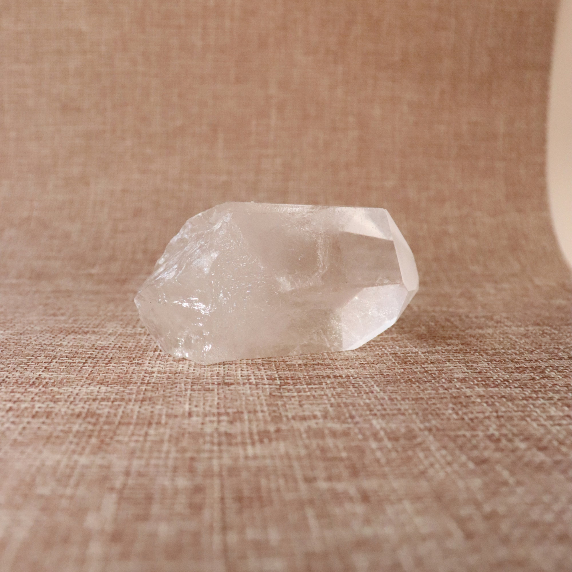 A raw Clear Quartz point chosen to support clarity, focus, and energy amplification.